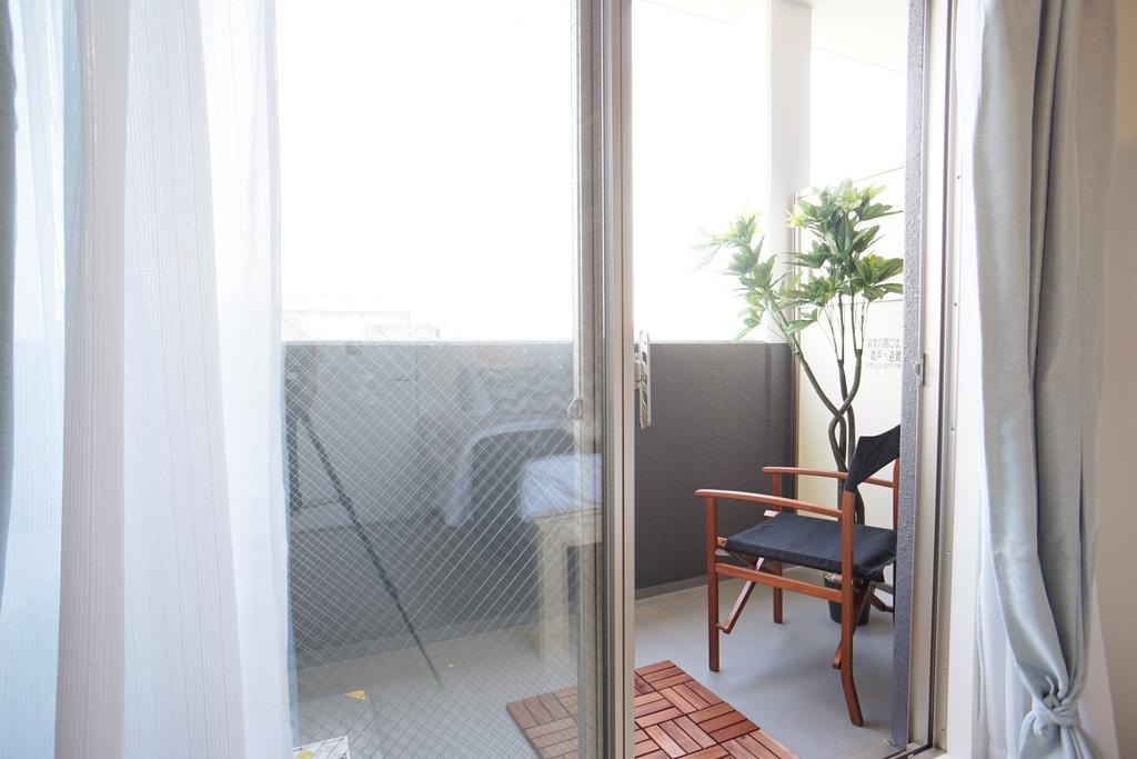 Uro Apartment Osaka Buitenkant foto