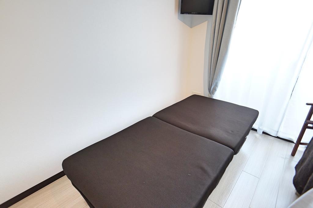 Uro Apartment Osaka Buitenkant foto